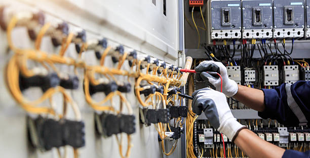 Professional Electrician technician working in Booker, TX
